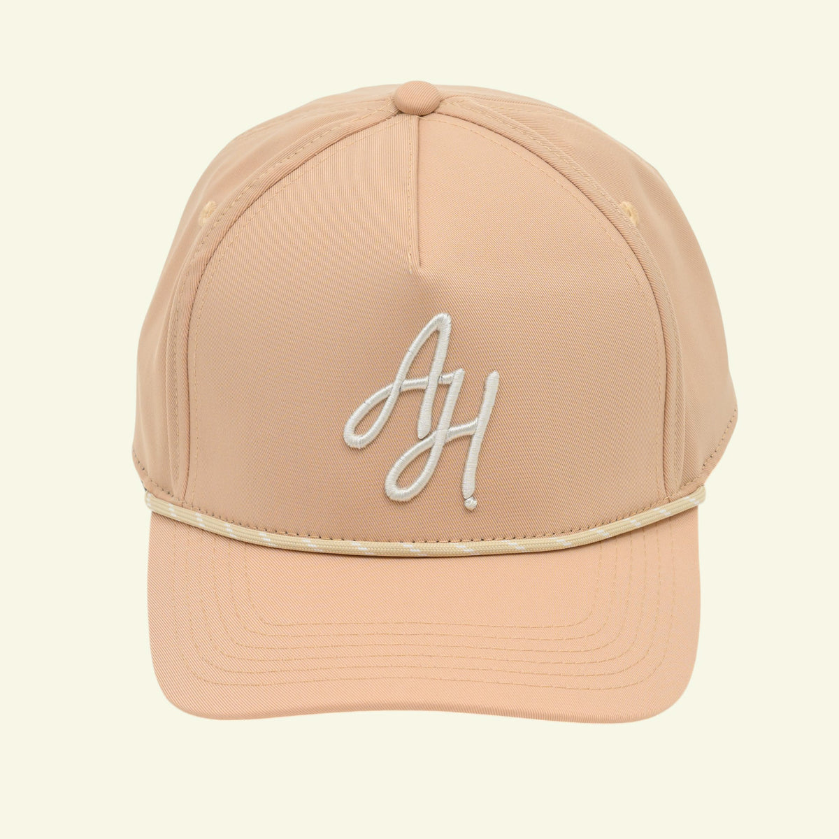 Tan Albatross Hunting A-frame rope cap, front view, white AH script monogram and cream rope